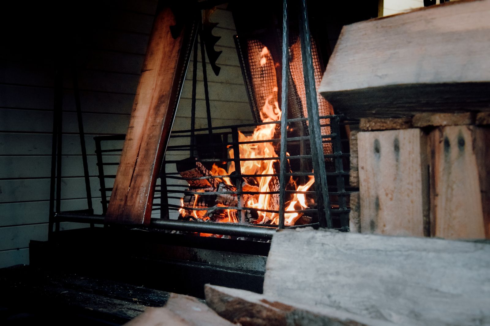 Logs burning in the lodge hearth